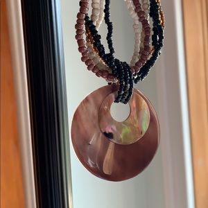 Artisan made shell pendant, beaded chains necklace